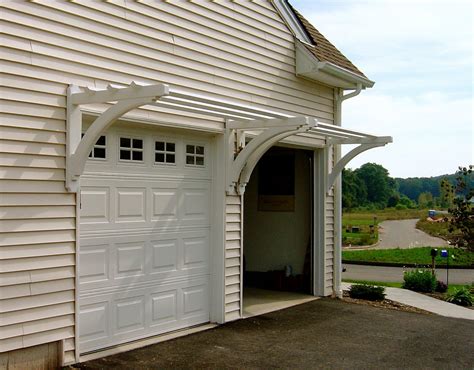 To attach the pergola to a building, you will screw joist hangers to the building. . Pergola over garage door kits